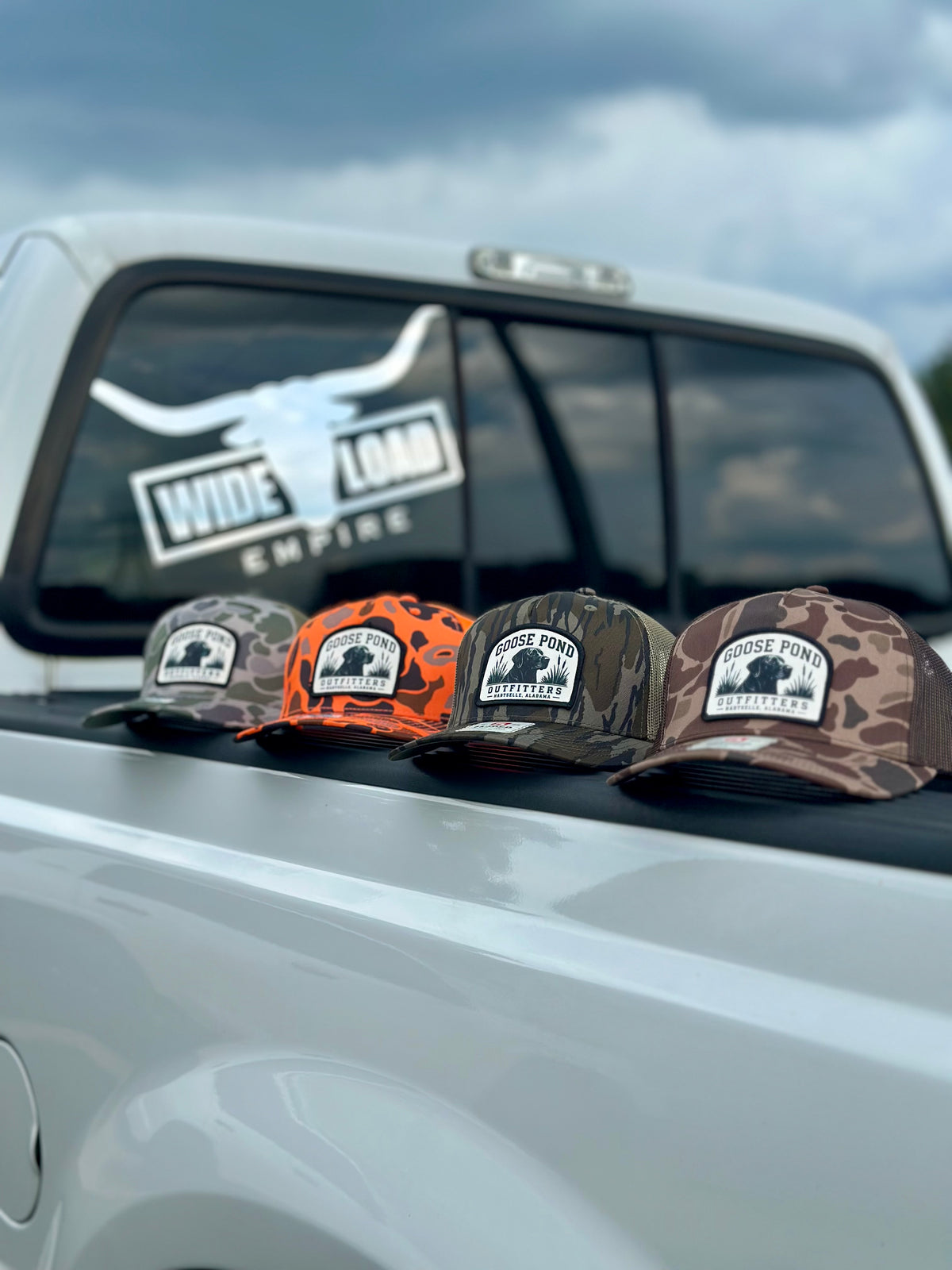 Richardson 112 camo trucker hats with Goose Pond Outfitters patches